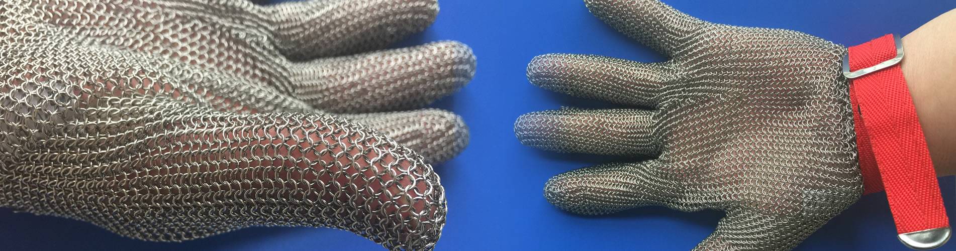 Two hands are wearing chainmail gloves with palms facing up.